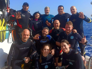 Professional divers on a boat in Diving Hurghada